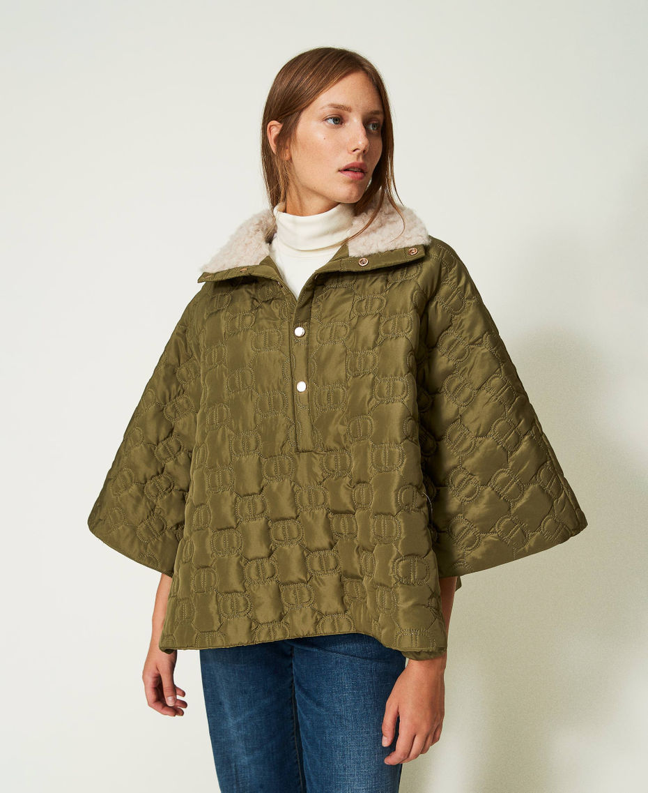 Quilted cape with Oval T