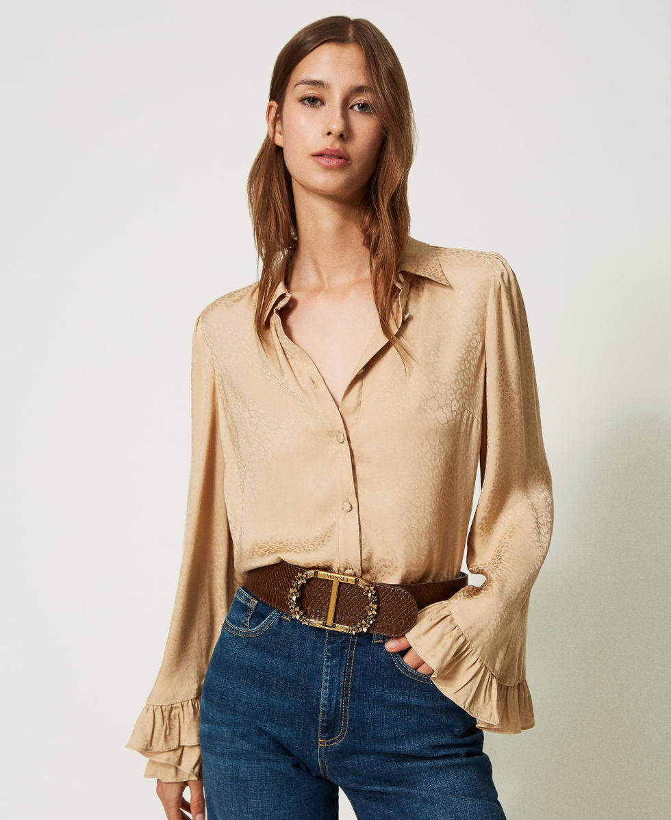 Belt with floral Oval T buckle