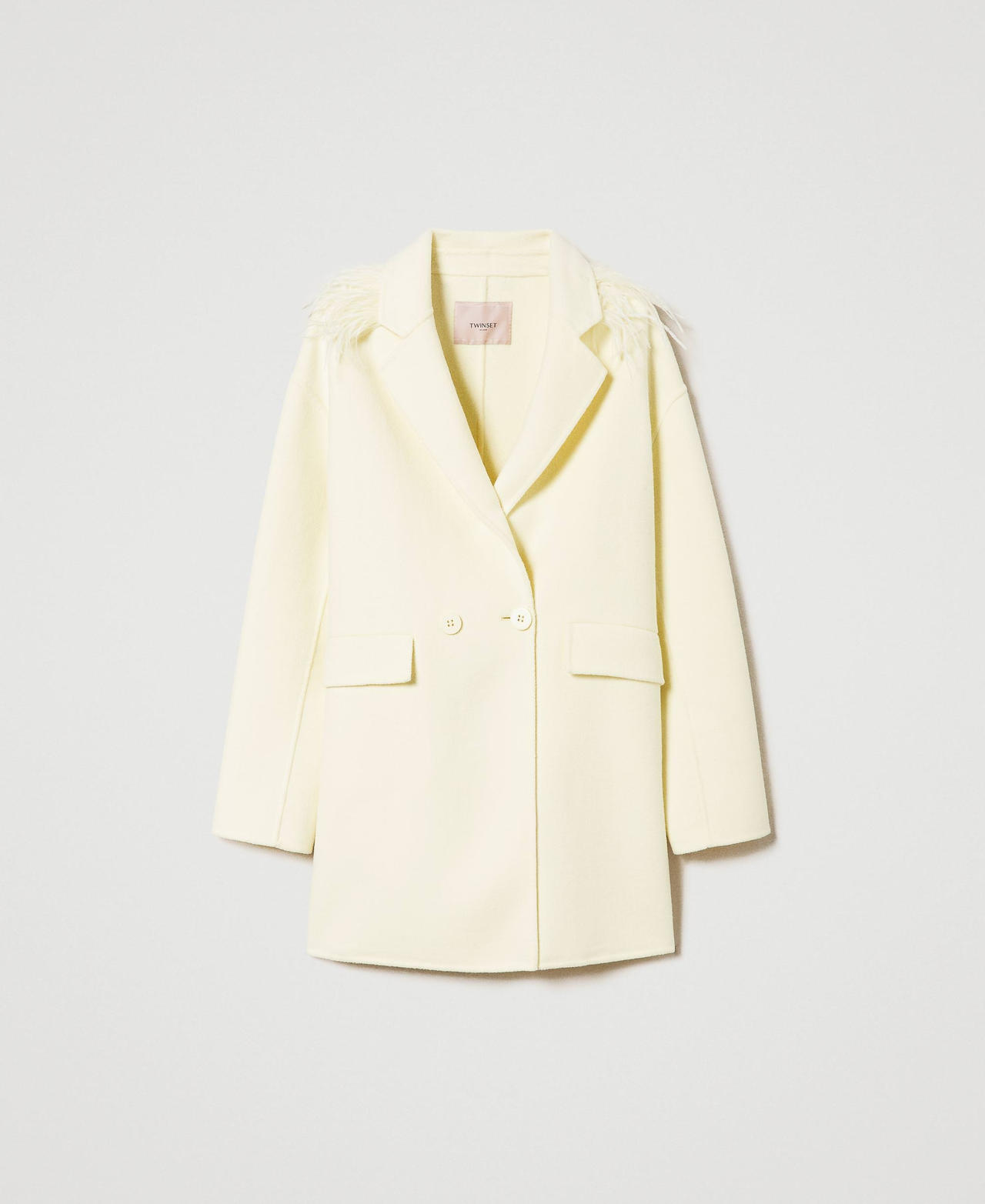 Manteau court en tissu double de laine avec plumes
