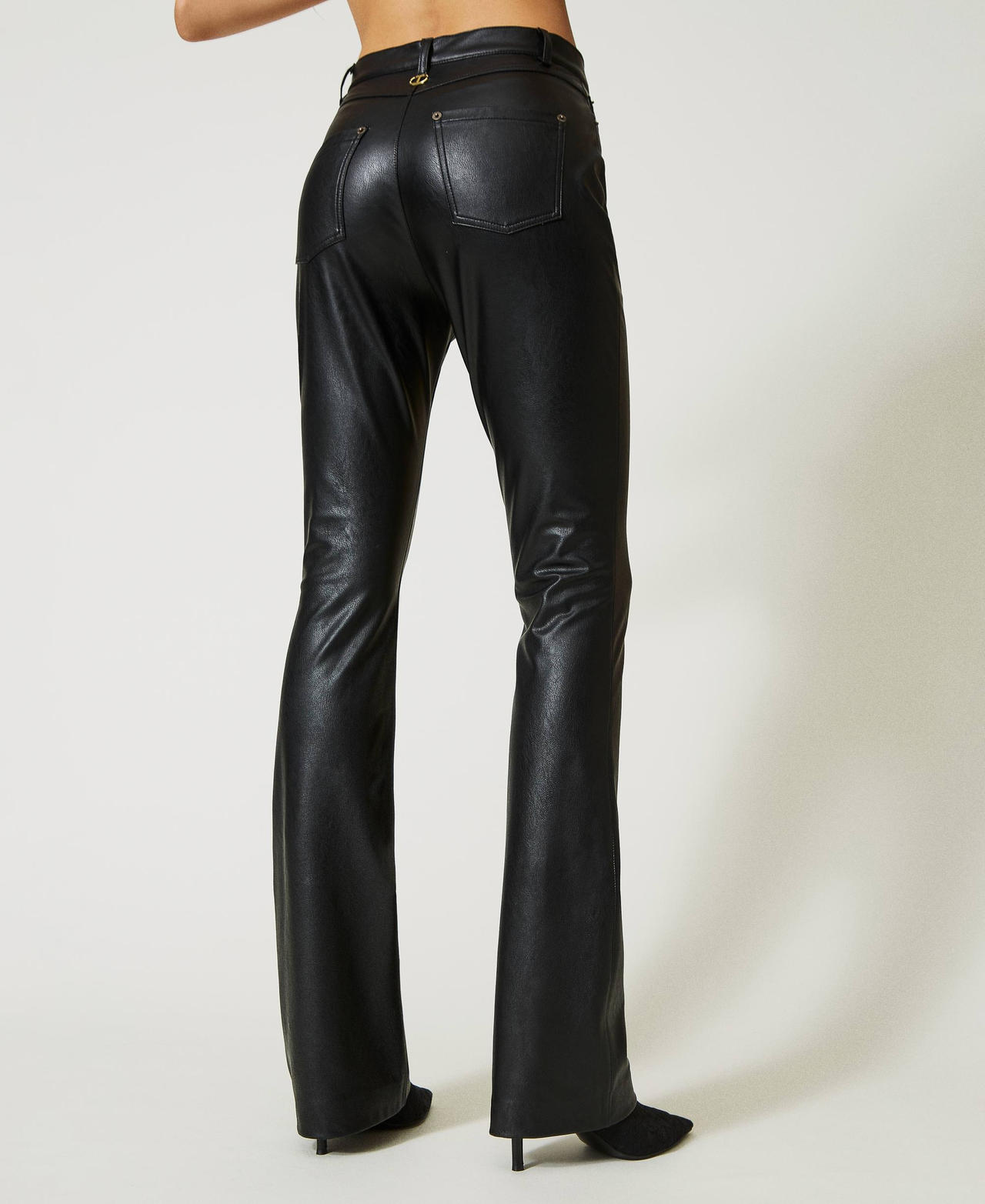 Leather-like flared trousers