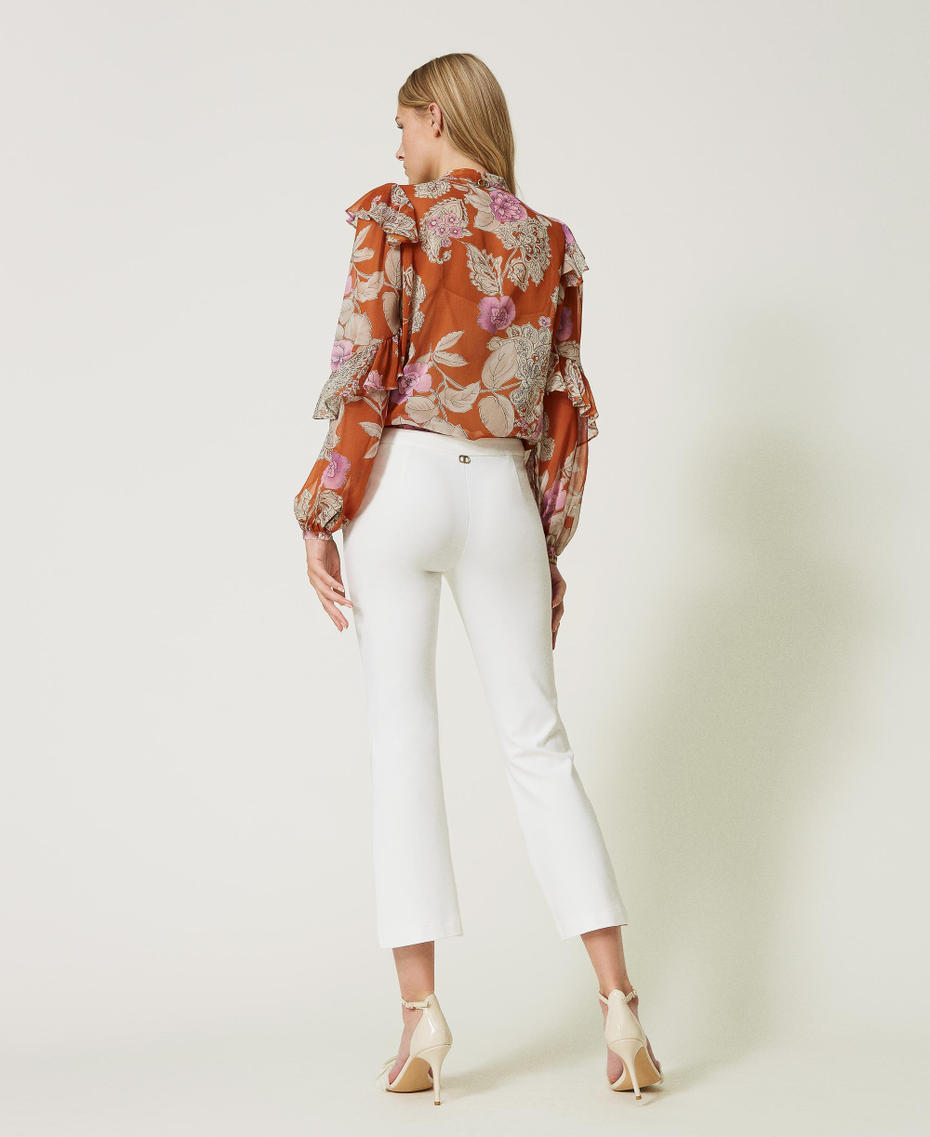 Cropped trousers with slit