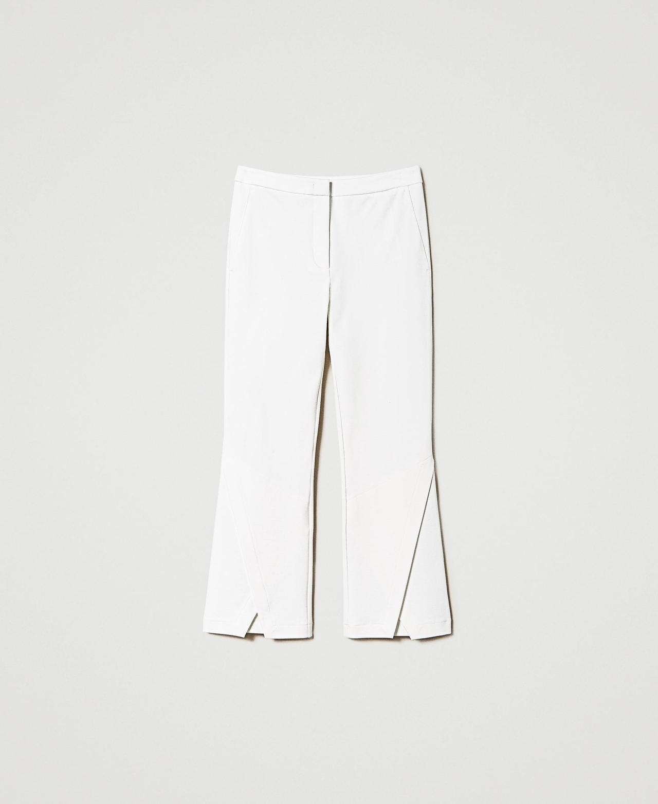 Cropped trousers with slit