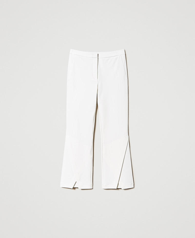 Cropped trousers with slit