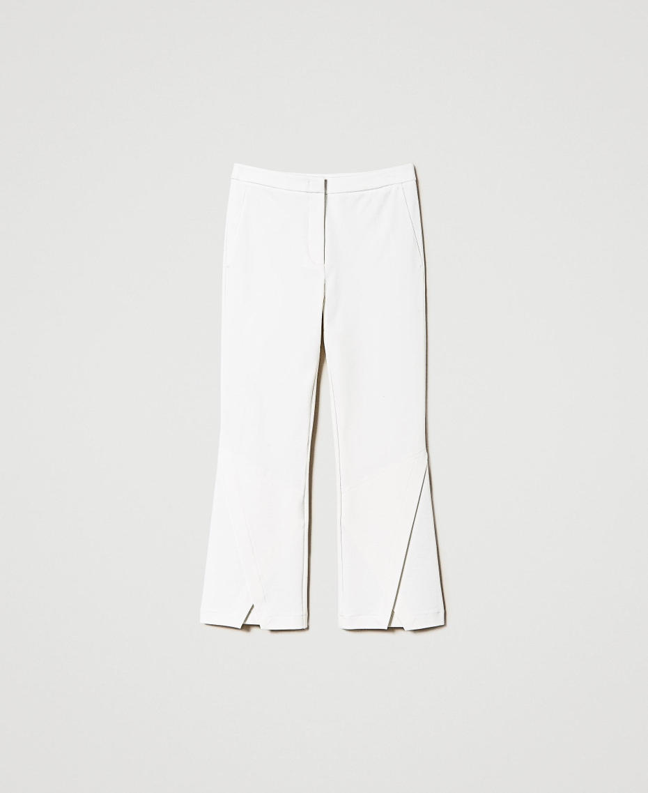 Pantaloni cropped con spacco