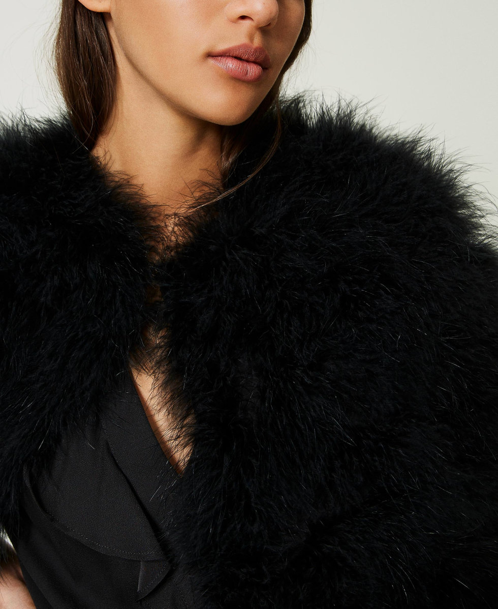 Cape jacket with feathers