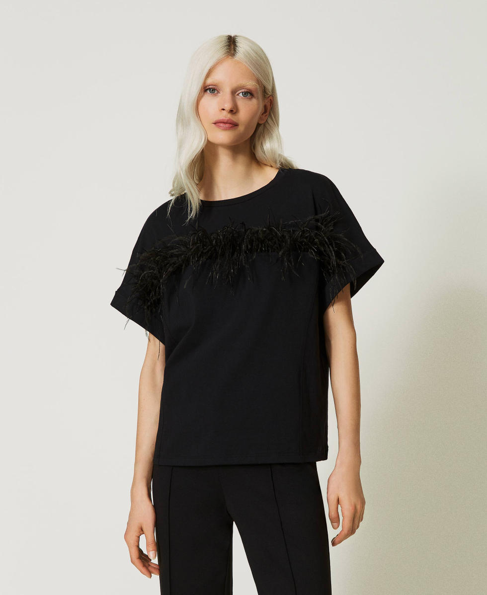 Magliette con piume new arrivals