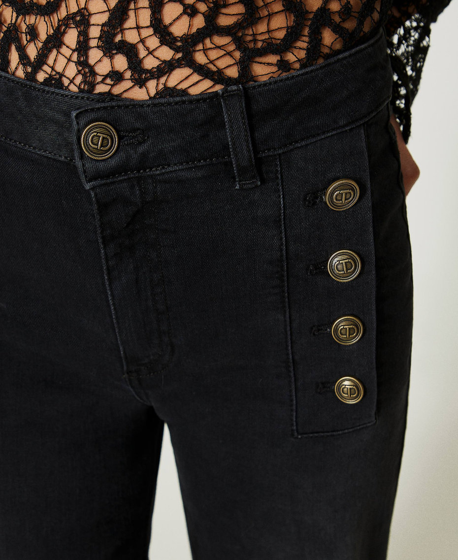 Wide leg jeans with logo buttons