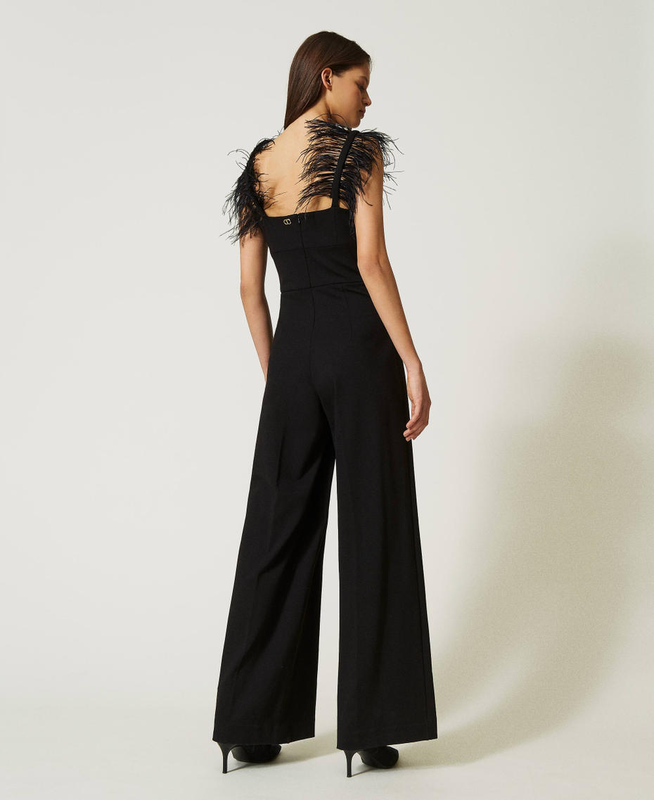 Long jumpsuit with feathers