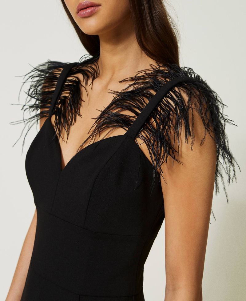Long jumpsuit with feathers