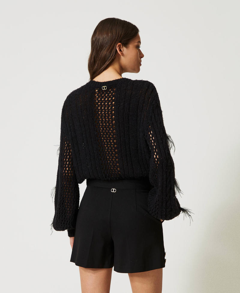 Short avec boutons siglés
