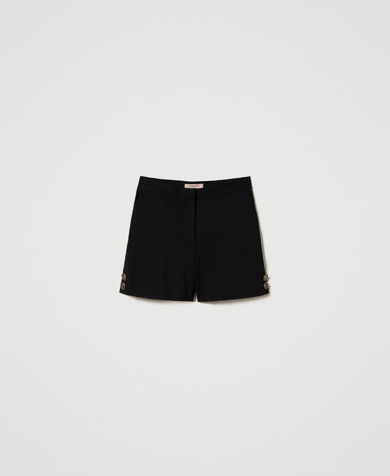 Short avec boutons siglés