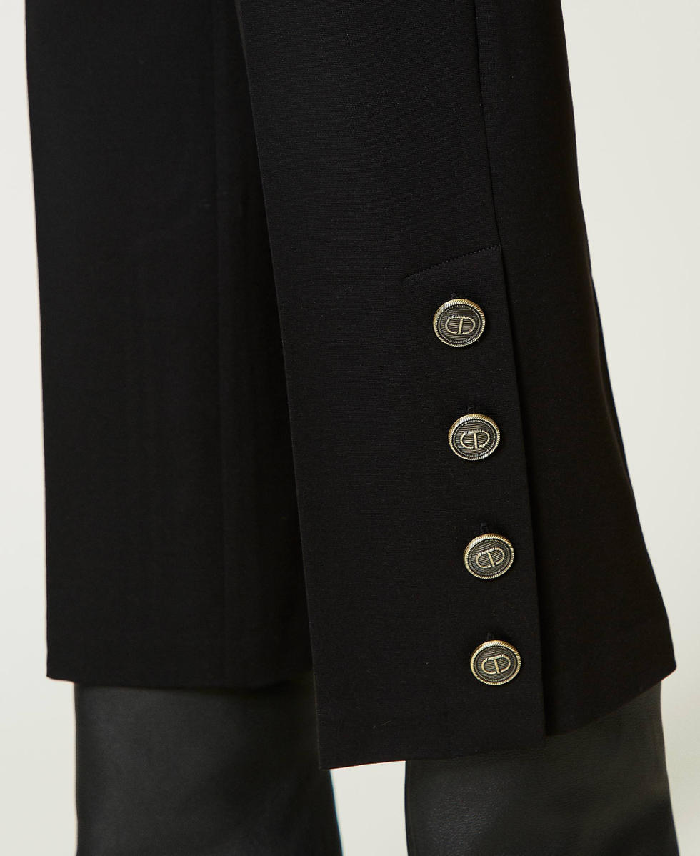 Cropped trousers with buttons