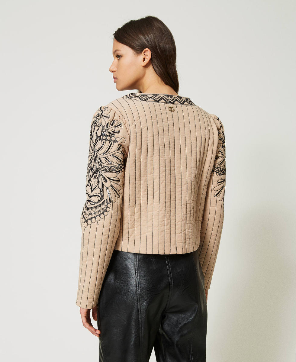 Quilted jacket sales knit sleeves