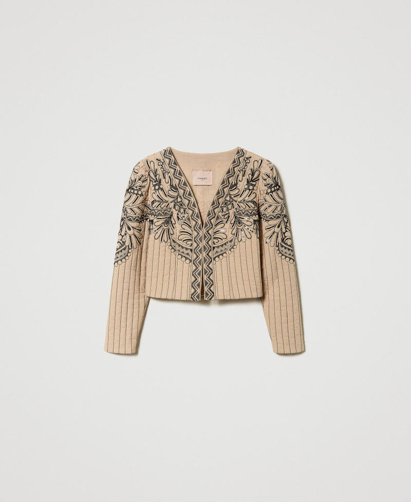 Quilted jacket with handmade embroidery