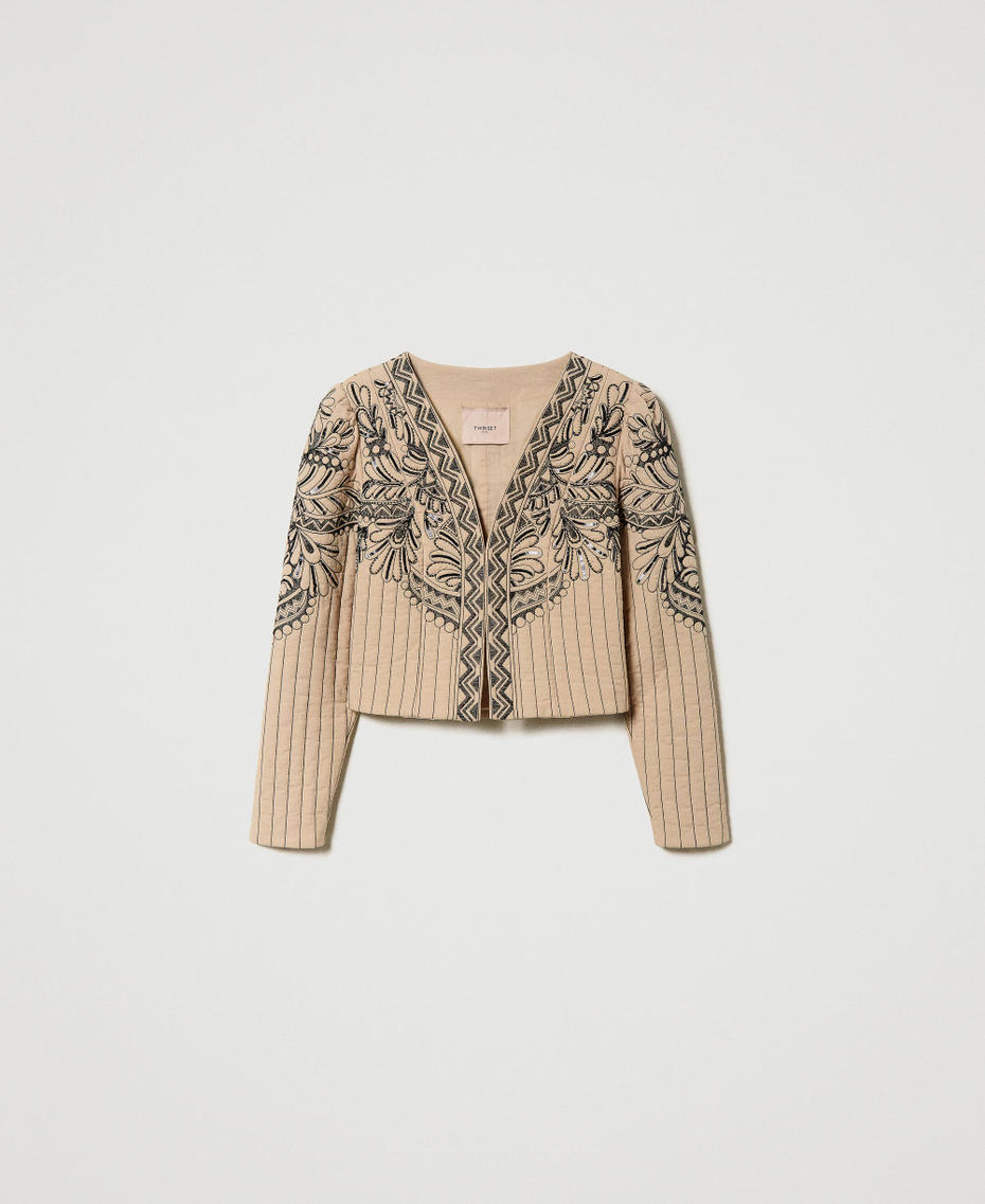 Quilted jacket with handmade embroidery