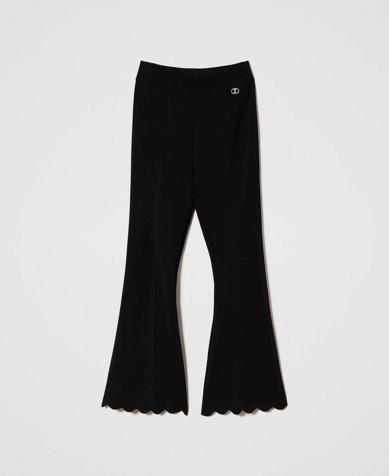 Flared knit trousers with scalloped hem