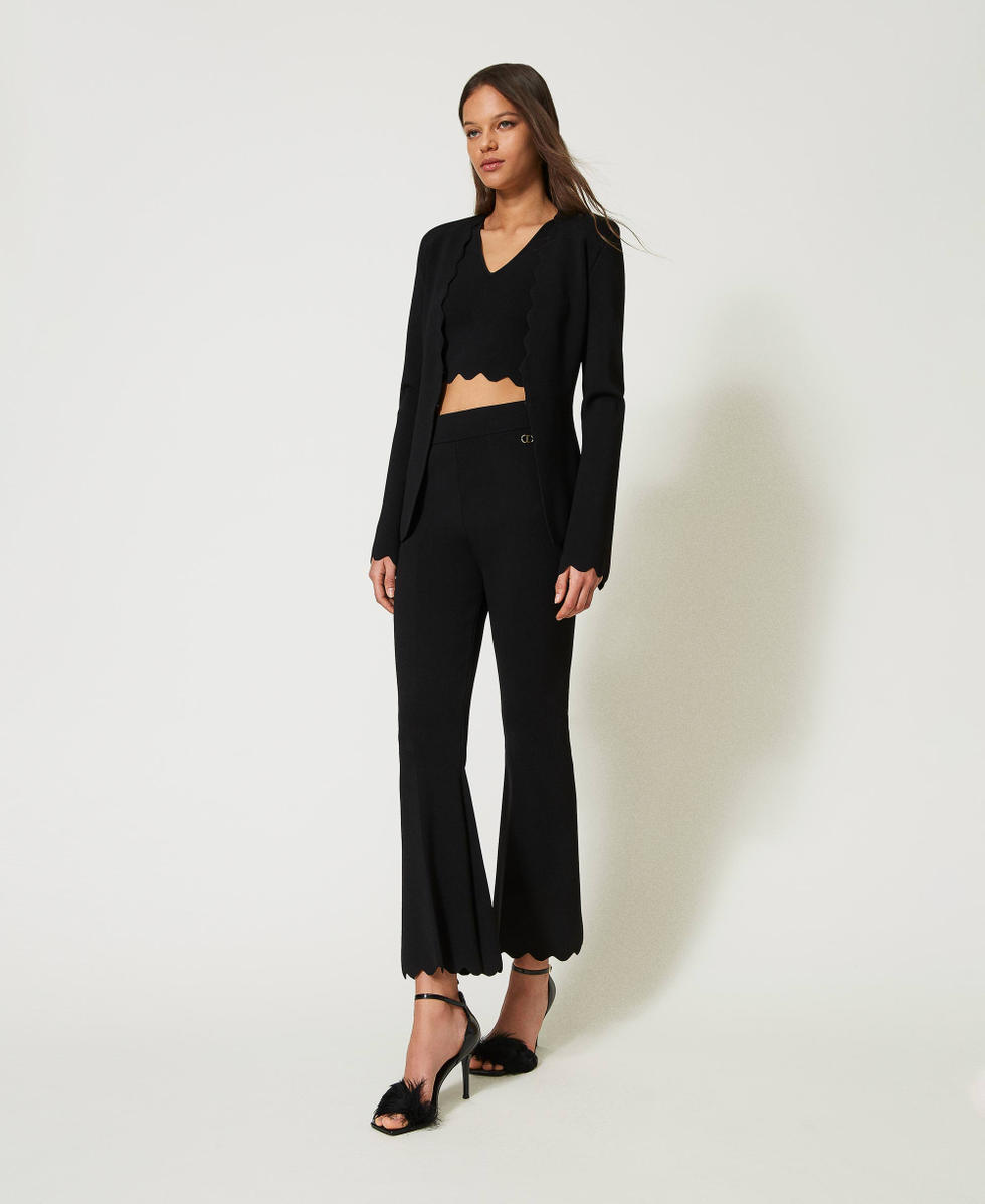 Flared knit trousers with scalloped hem Woman, Black