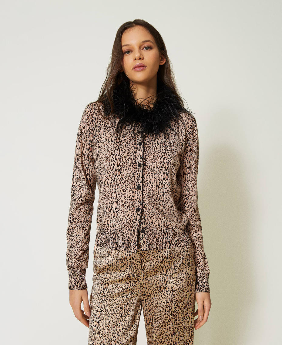 Animal print cardigan with feathers