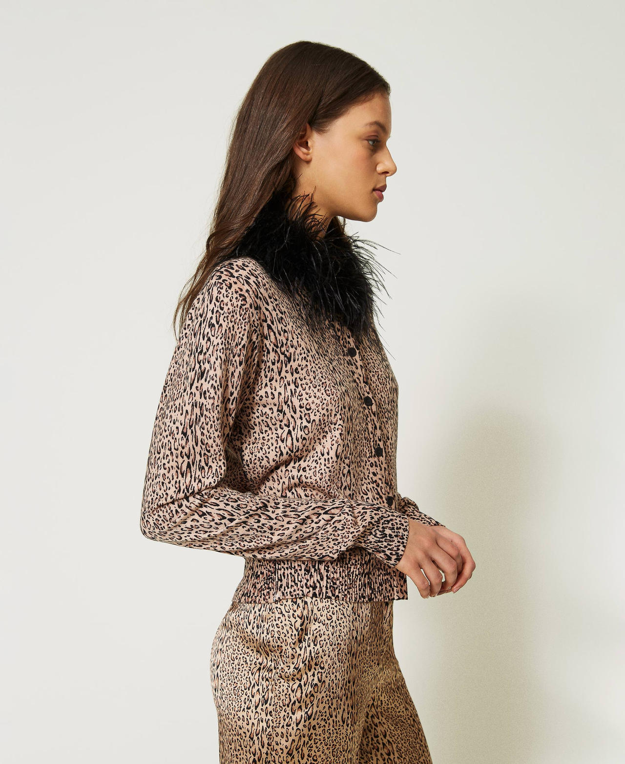 Animal print cardigan with feathers