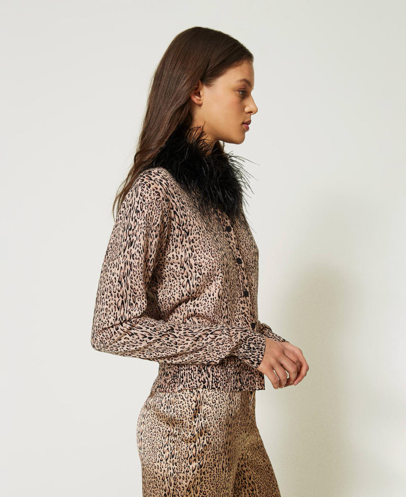 Animal print cardigan with feathers