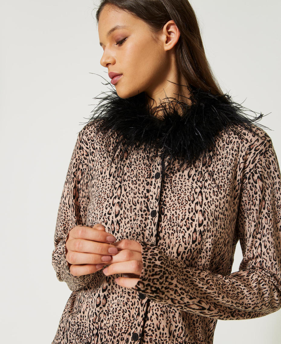 Animal print cardigan with feathers
