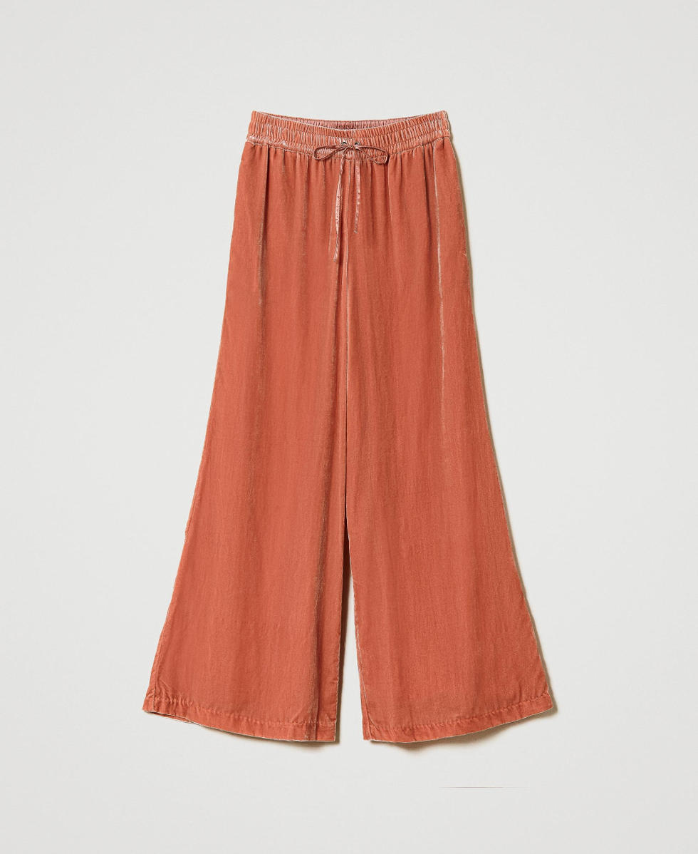 Pantaloni a palazzo in velluto pann&eacute;