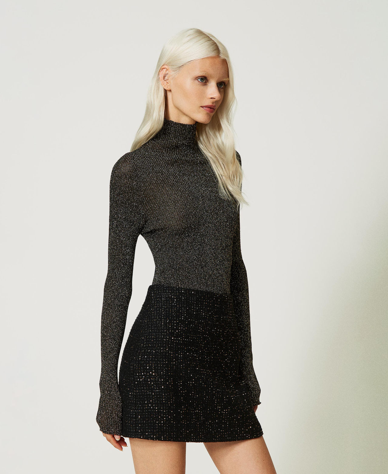 Pull col montant en lurex côtelé