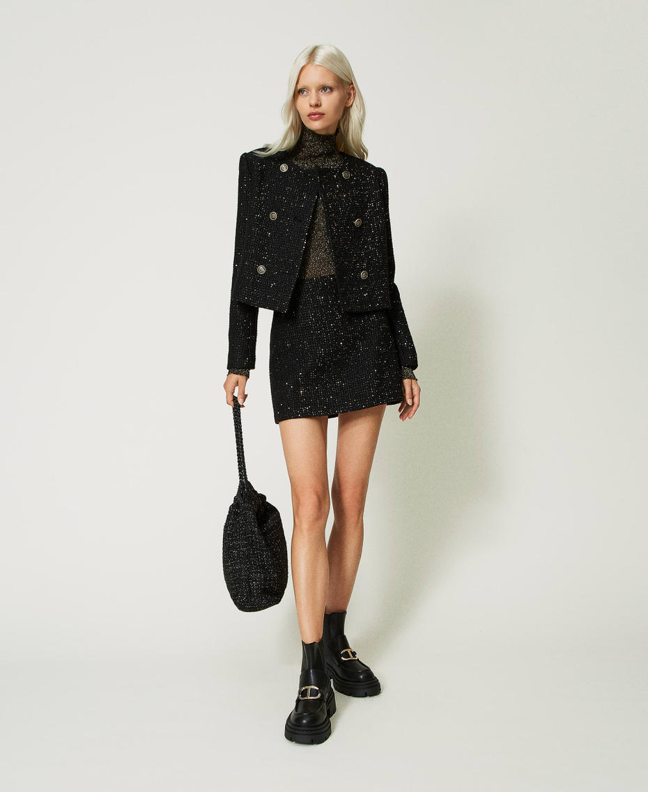 Pull col montant en lurex côtelé