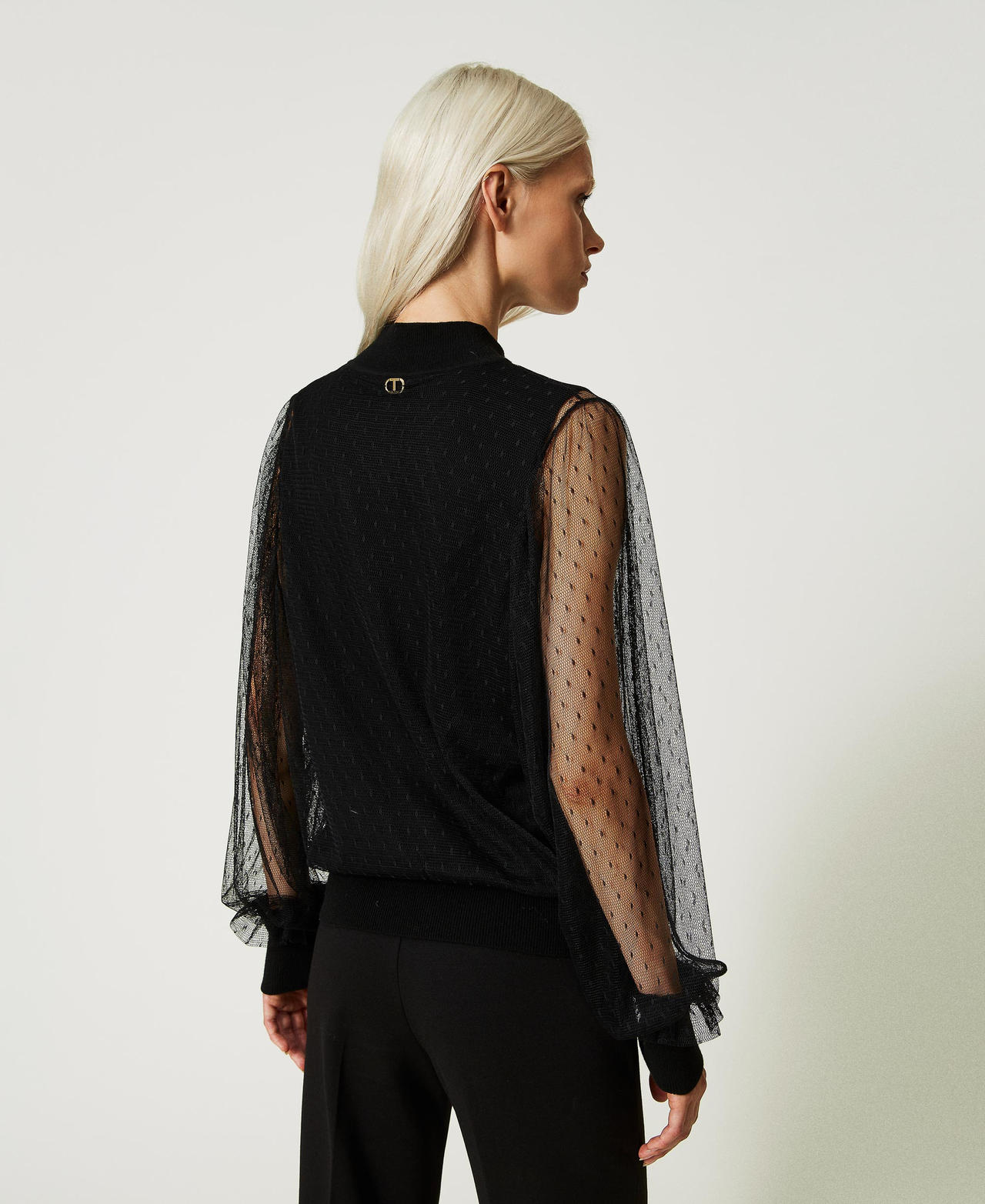 Top in maglia e tulle plumetis