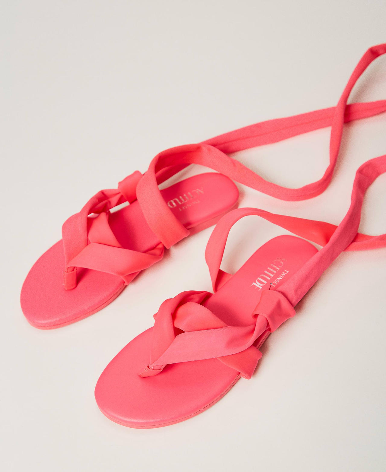 Flat sandals with criss-crossed laces "Bright Coral” Fuchsia Woman 241ACT052-02
