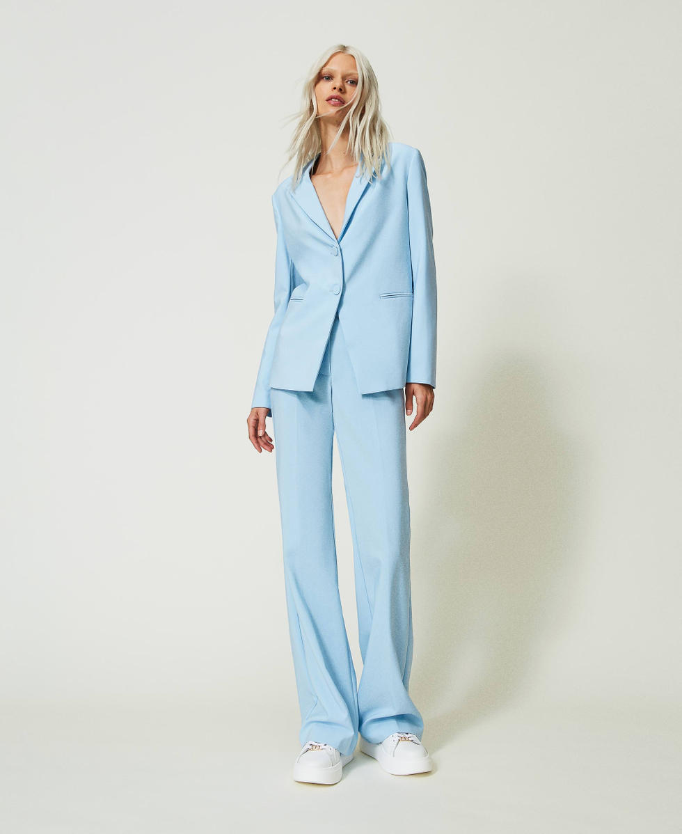 Flared technical fabric trousers