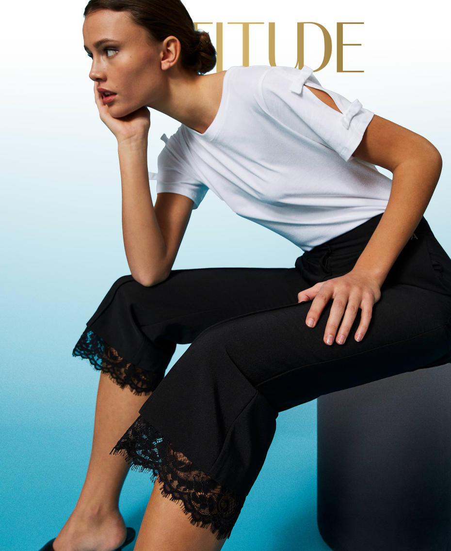 Cropped trousers with macramé lace
