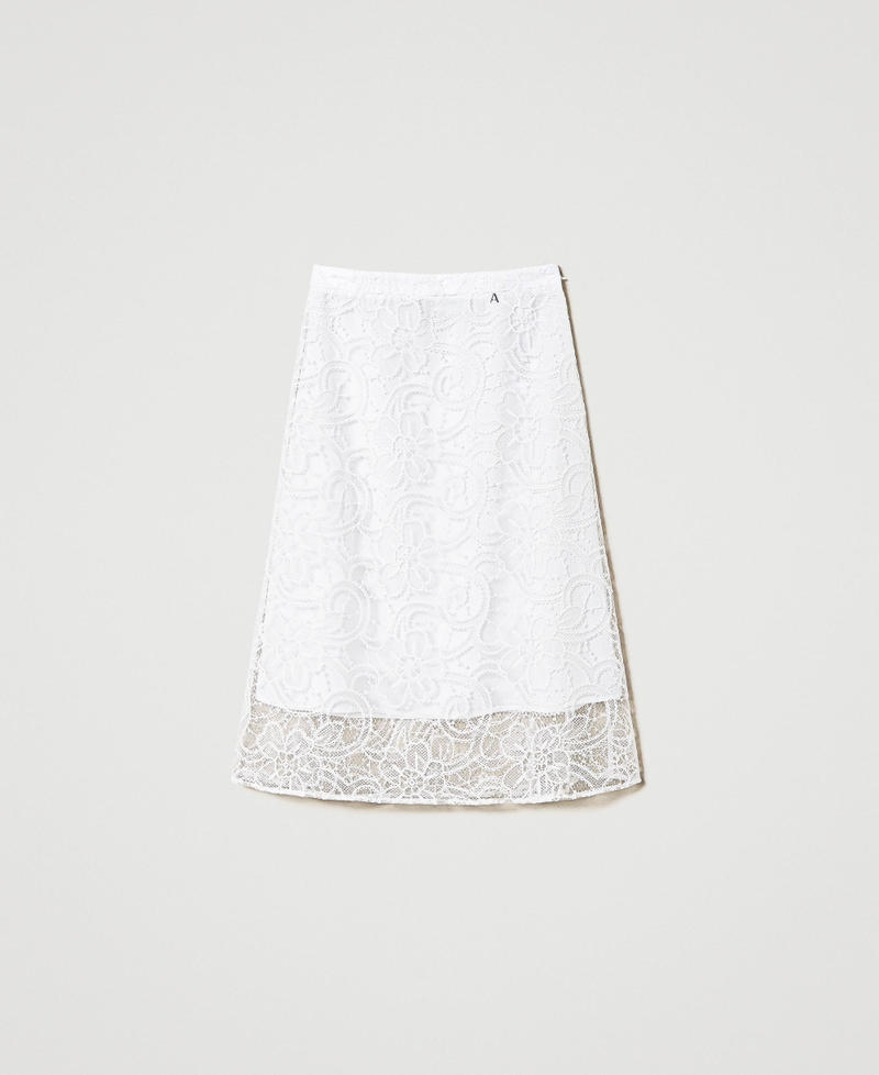 Jupe mi-longue en organza brodé