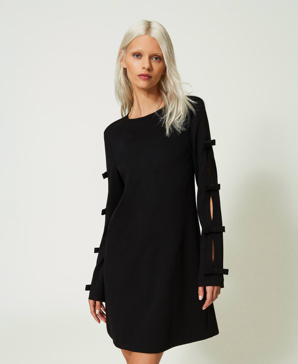 Short dress with small bows