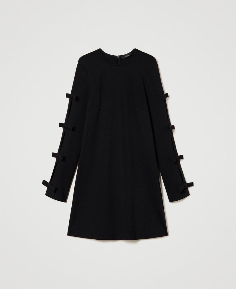 Short dress with small bows