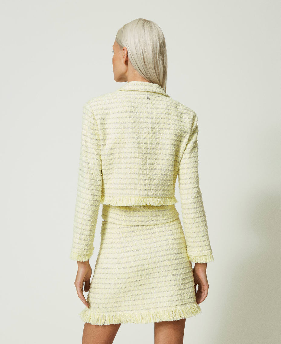 Bouclé jacket with fringes
