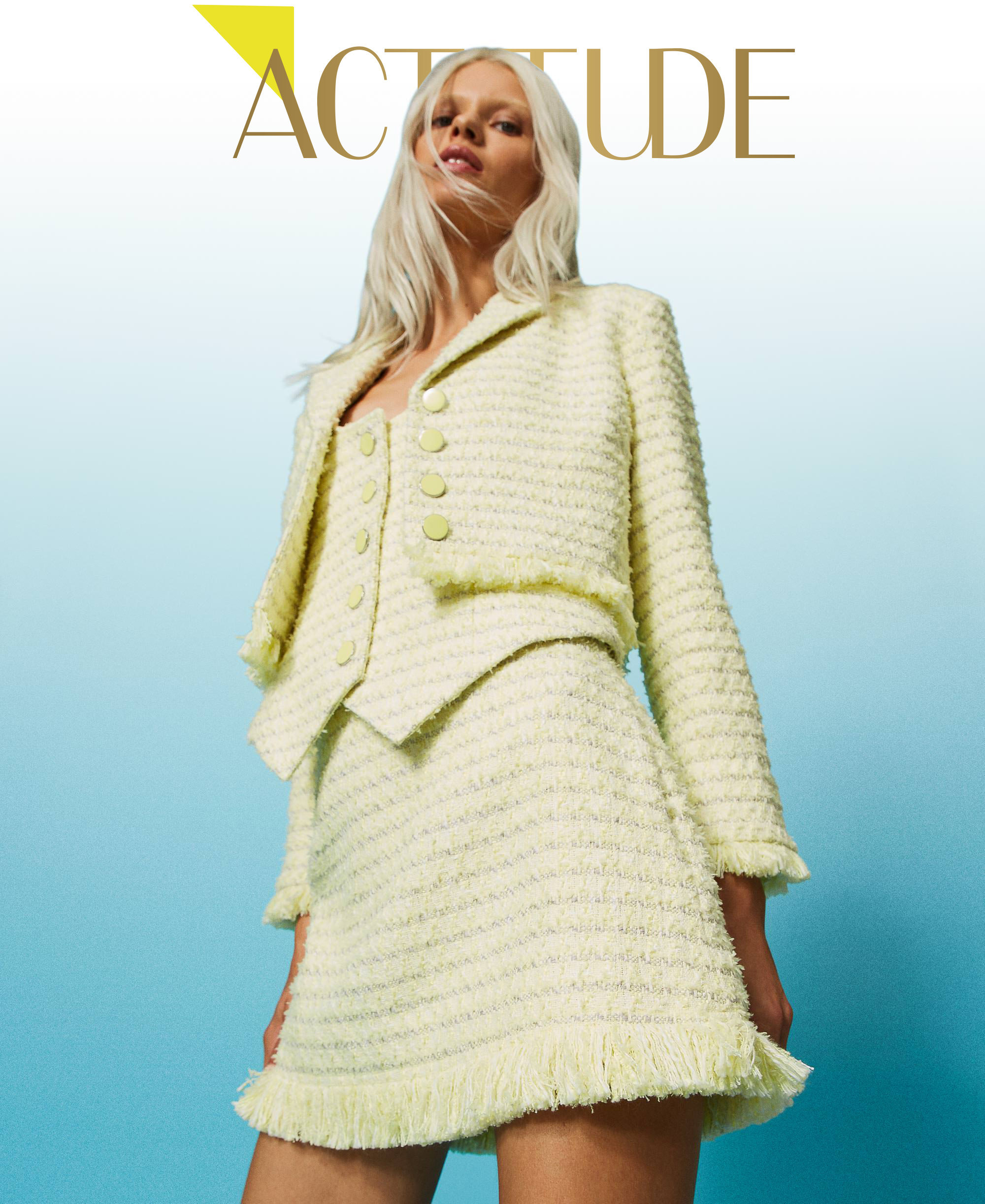 Boucl&eacute; miniskirt with fringes