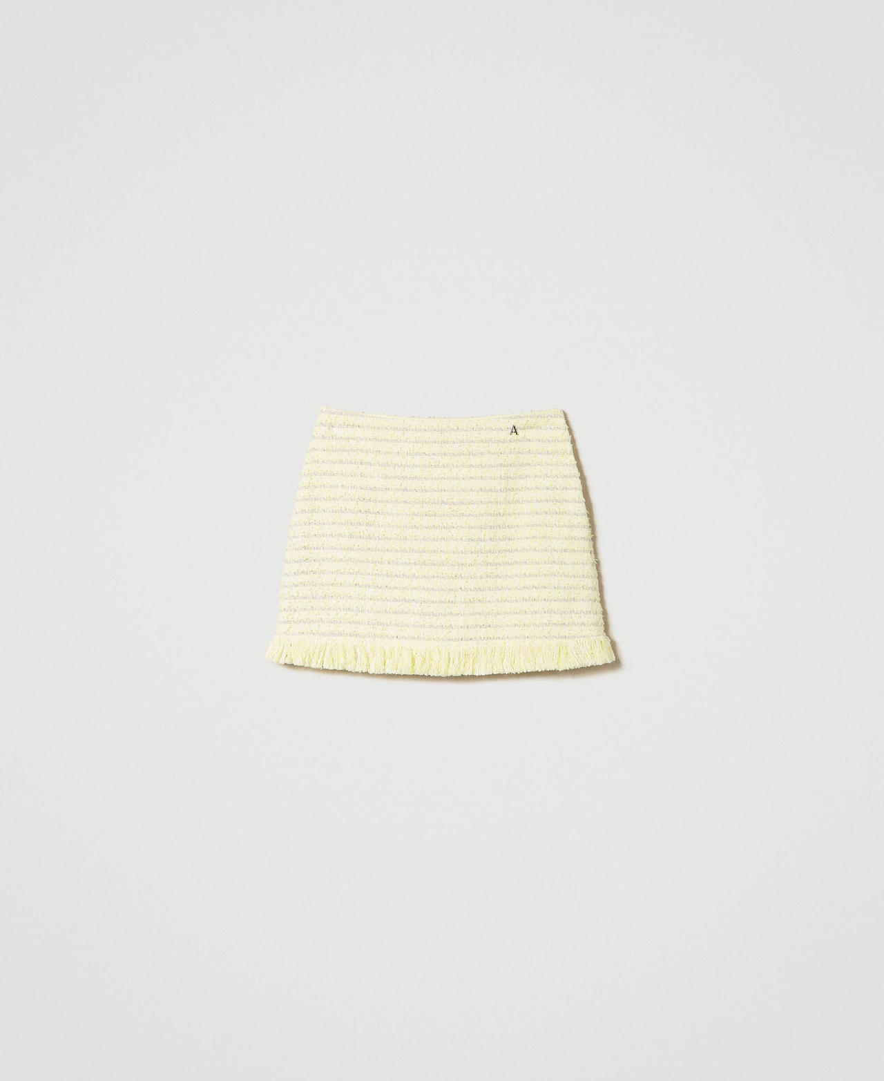 Bouclé miniskirt with fringes