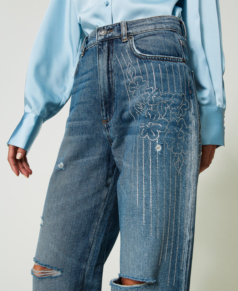 Jeans con strass sulle tasche sale
