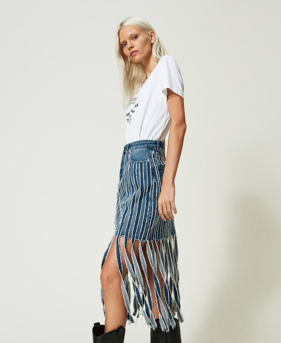 Denim miniskirt with fringes