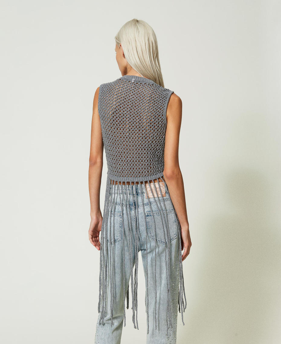 Top en filet lurex avec franges