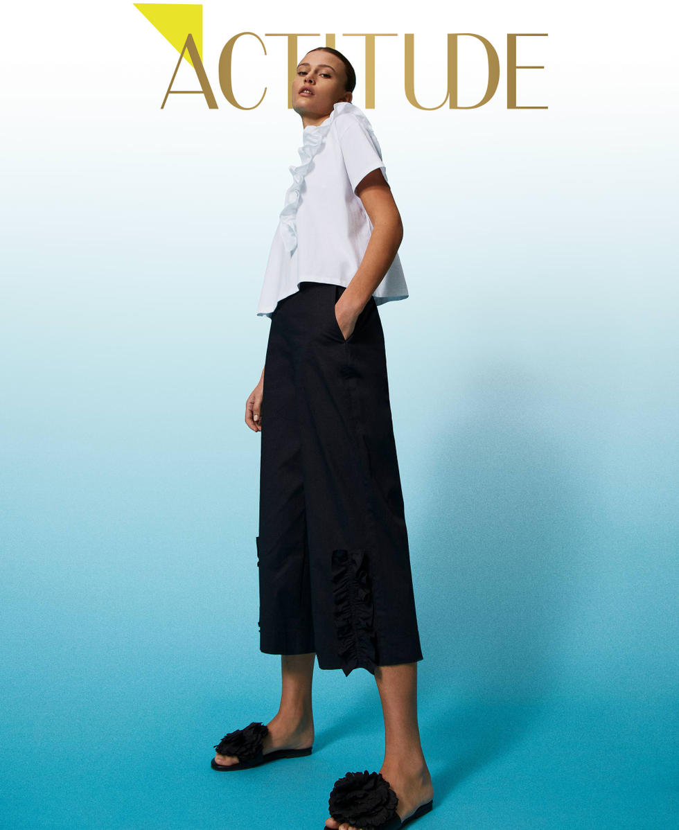 Pantaloni cropped con volant