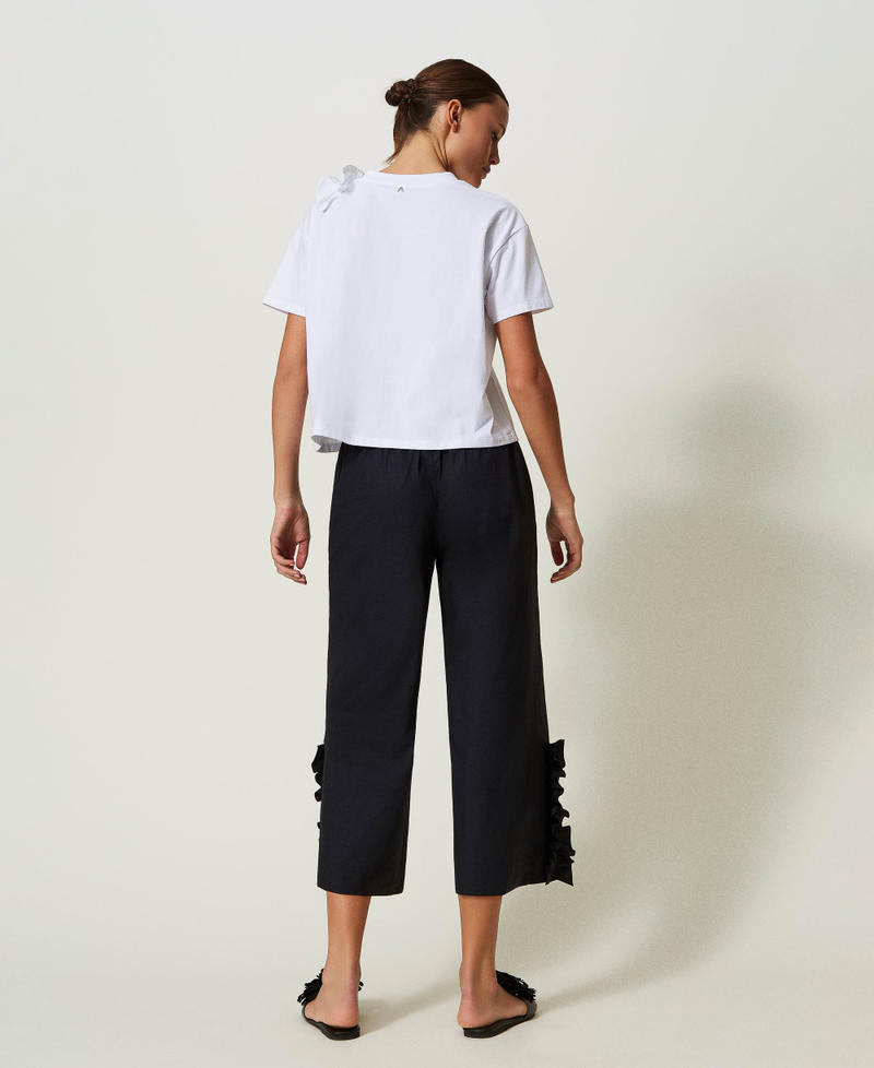 Cropped trousers with ruffle Black Woman 241AT2083-03
