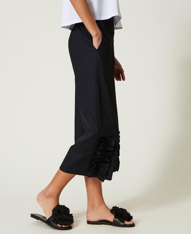 Cropped trousers with ruffle Black Woman 241AT2083-04