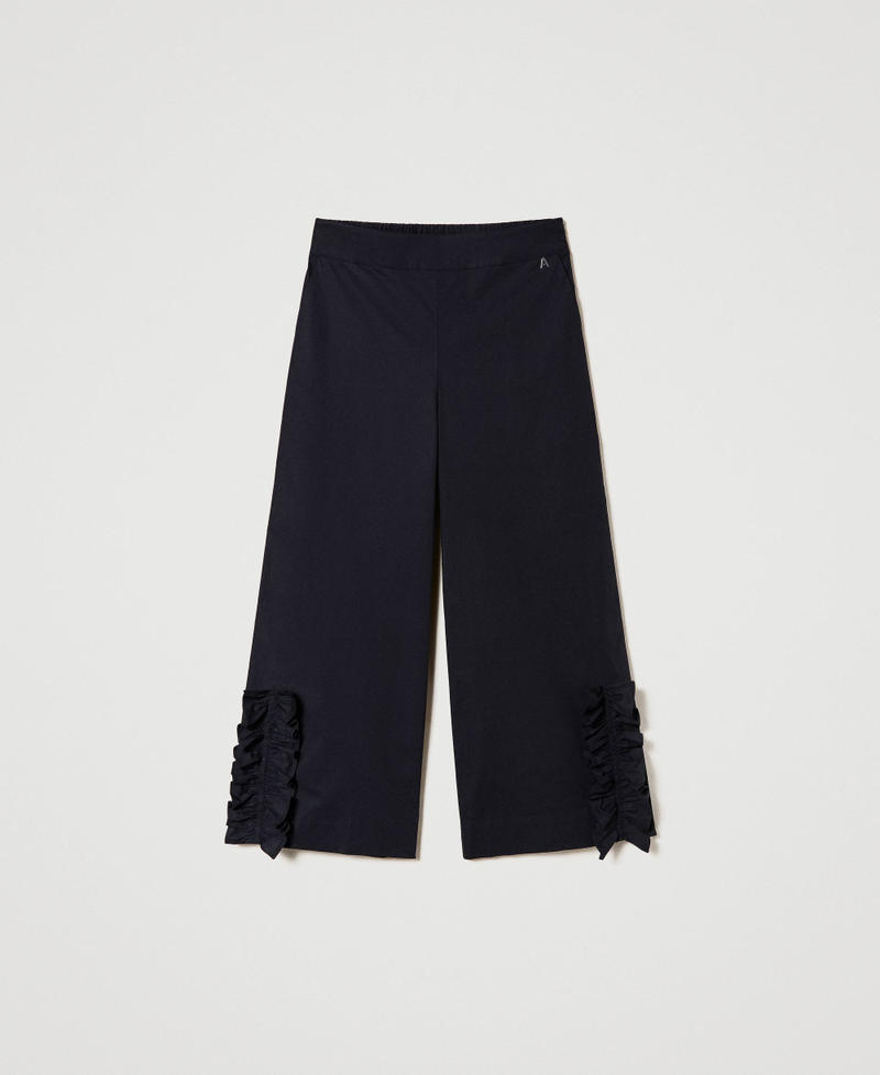 Cropped trousers with ruffle