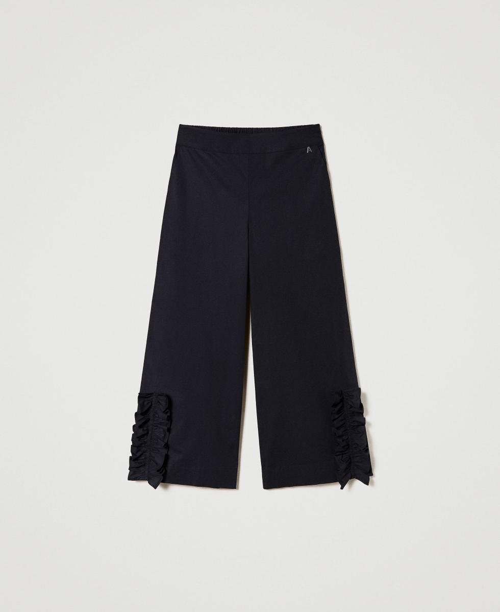 Pantaloni cropped con volant