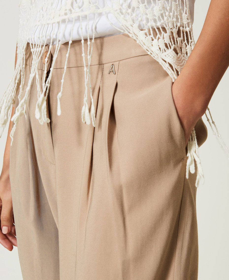 Pantalone largo con piegoni main image 0
