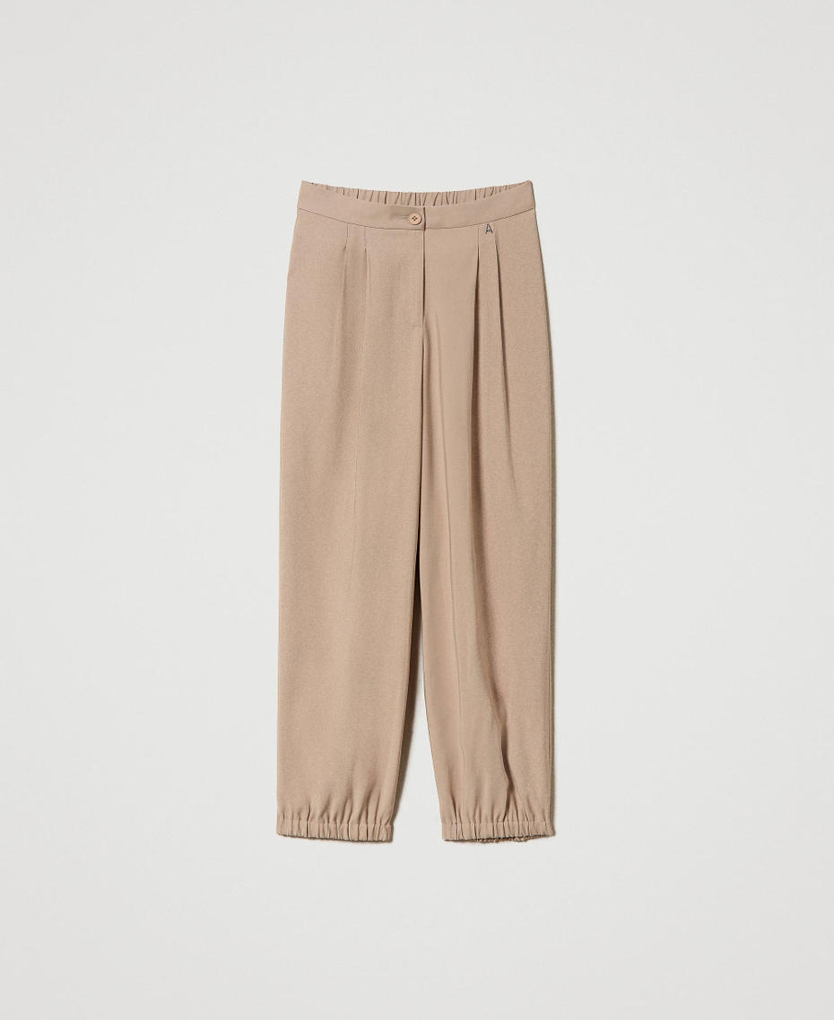 Joggers with pleats