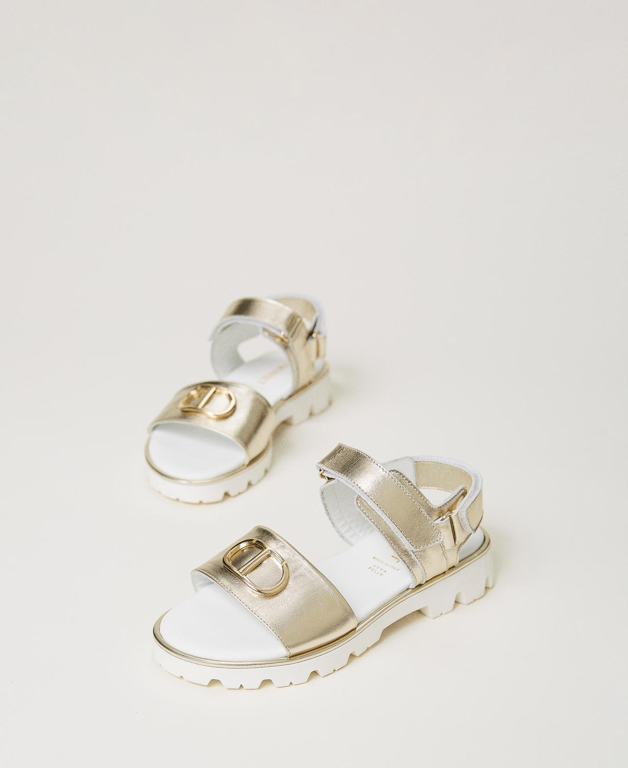 Laminated leather sandals with Oval T Platinum Girl 241GCJ064-02