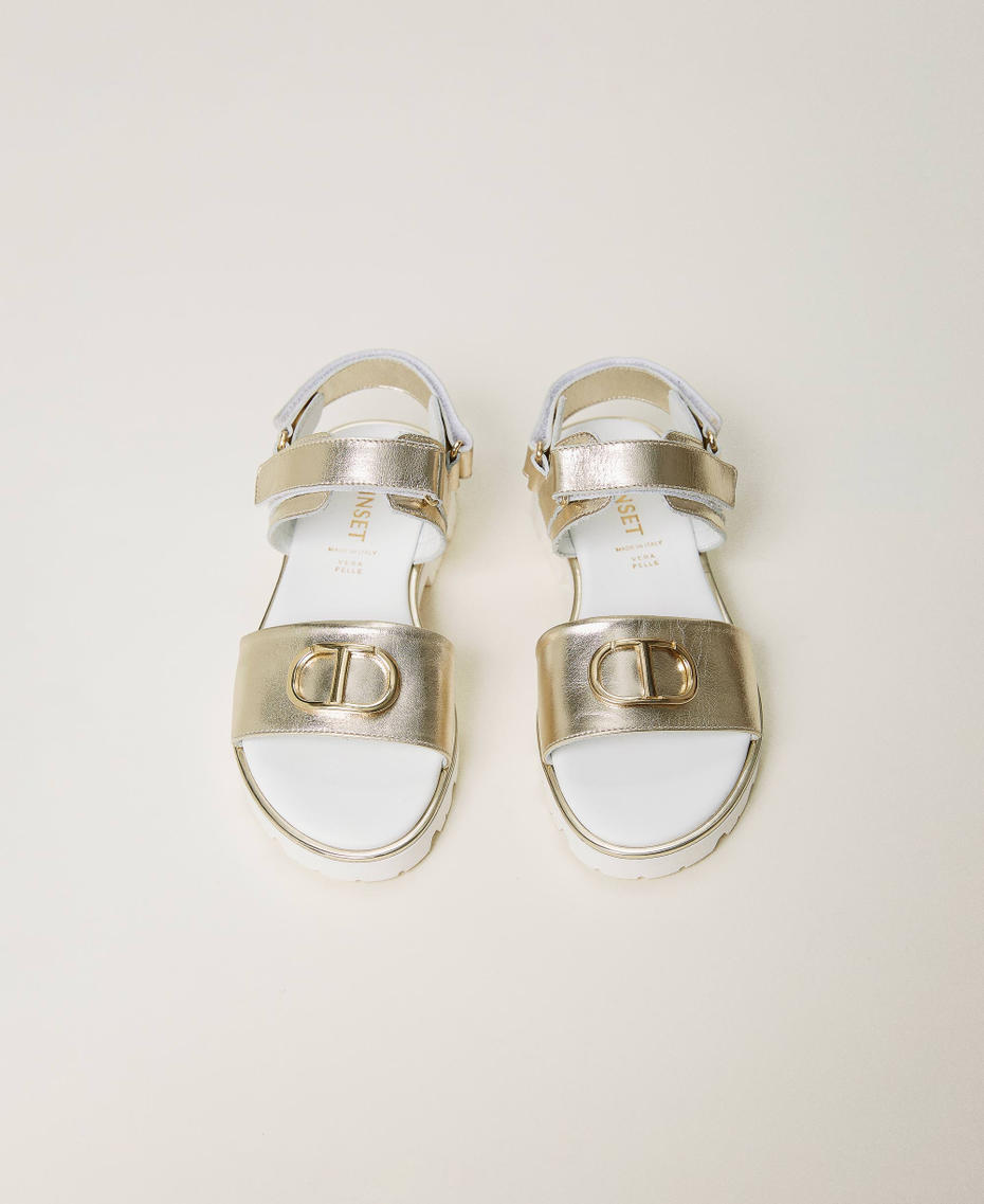Laminated leather sandals with Oval T